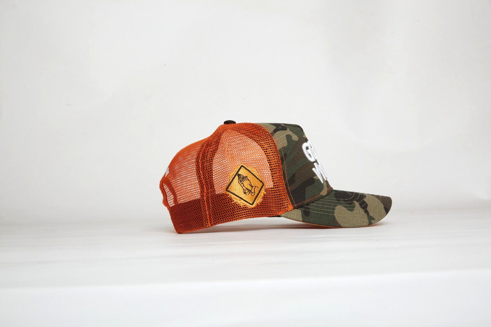 God’s Work- Signature Series Camo/Orange Mesh Snap-back Proclaim Clothing.